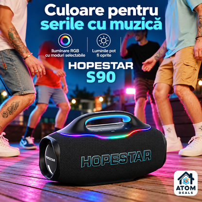 Boxă HOPESTAR S90 neagră, cu iluminarea RGB pornită, într-un decor de petrecere