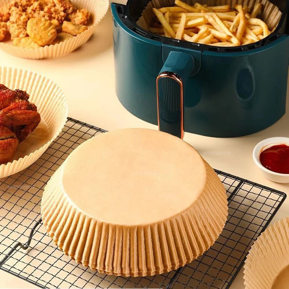 Non-stick air fryer liners: Convenient disposable paper pads for cooking.